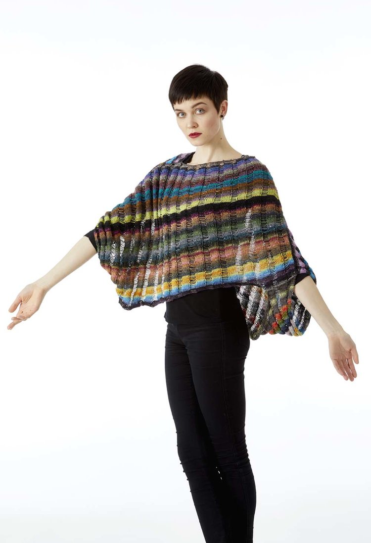 NELLE ENIRHTAK PONCHOBLUSE